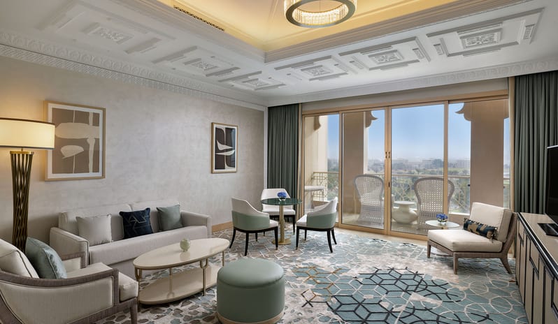 One Bedroom Golf Course View Suite Living room with sofa bed 229